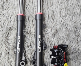 Combo phuộc trước, heo Racing Boy cho xe Honda UC3