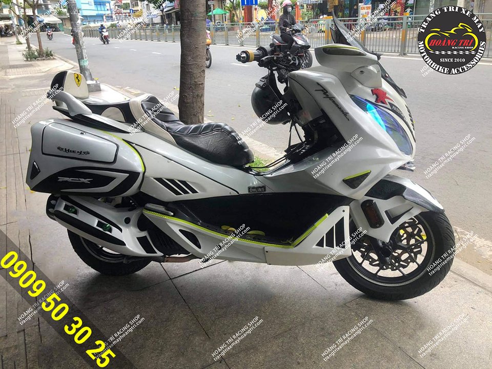 Composite muffler mounted for PCX 2014 and repainted to match the car