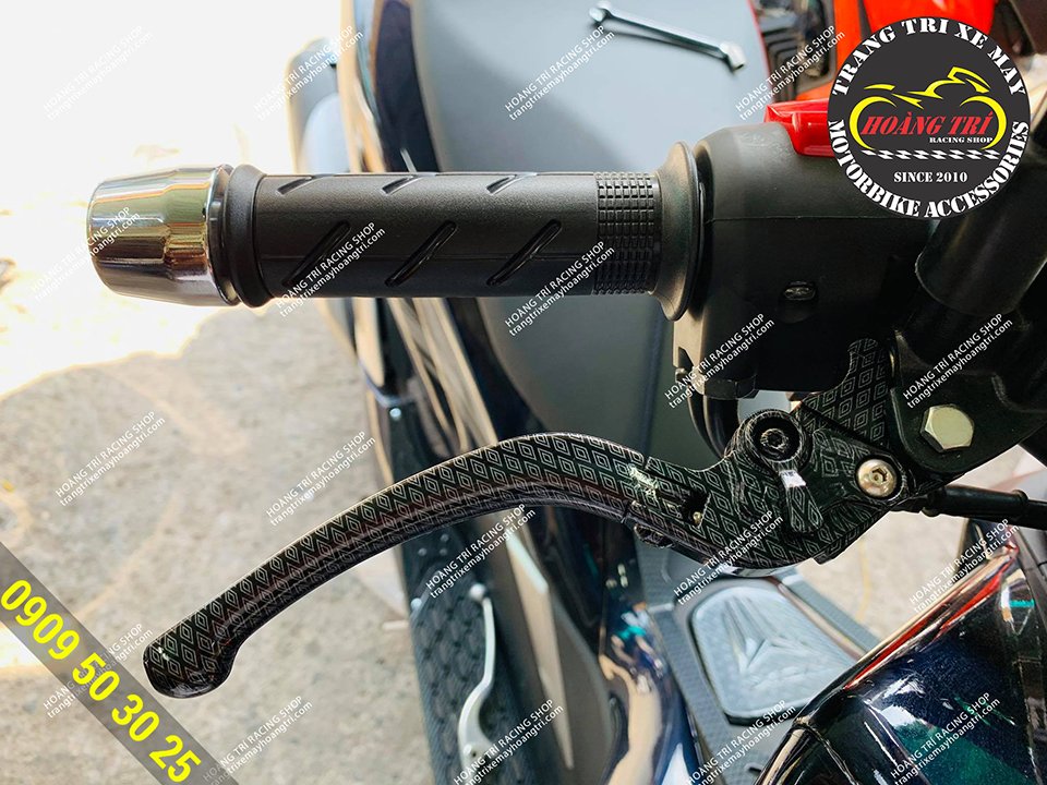 Close-up view of the PCX carbon diamond brake lever installed on the car (right hand brake)