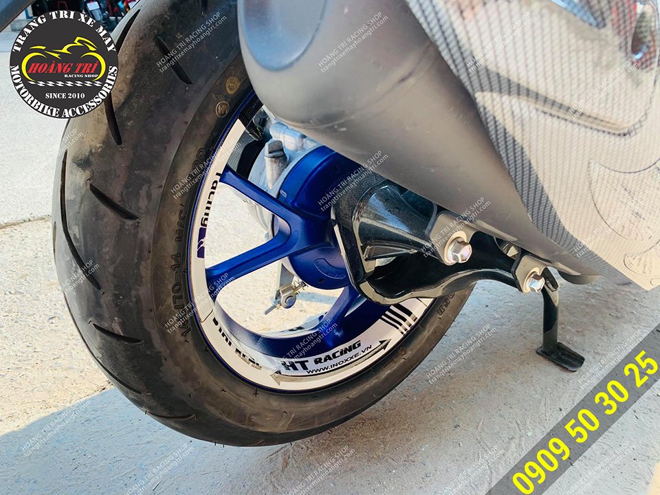 Close-up of the reflective decal on the rear wheel that has been pasted on the NVX 2021