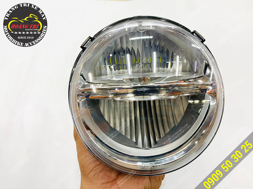 Vespa Primavera 2-stage headlamp cluster in hand