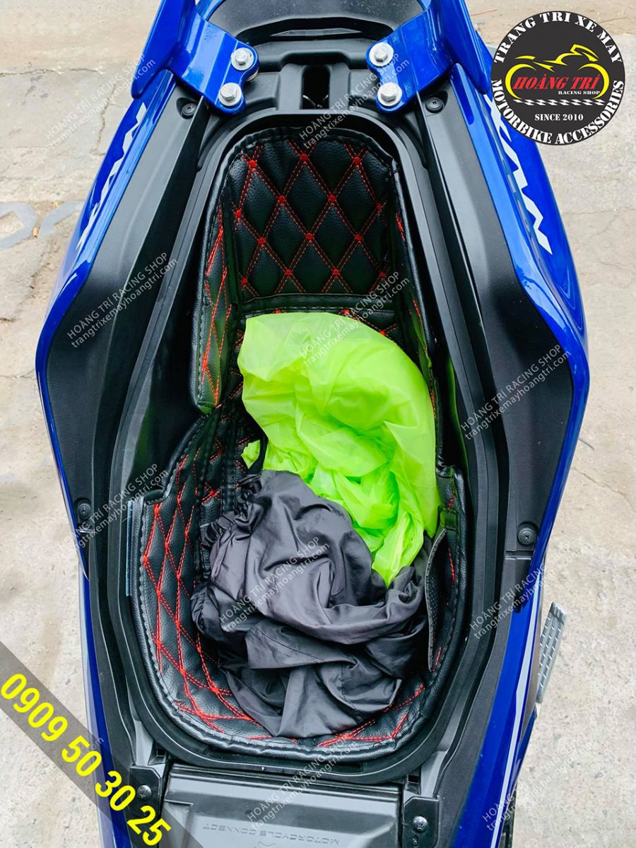 A close-up of the Yamaha NVX has been equipped with a motorcycle trunk liner