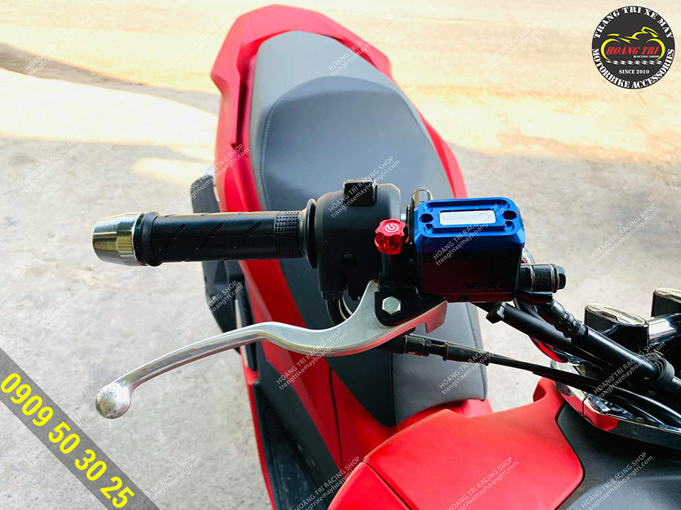 Blue product installed on red PCX 160 car