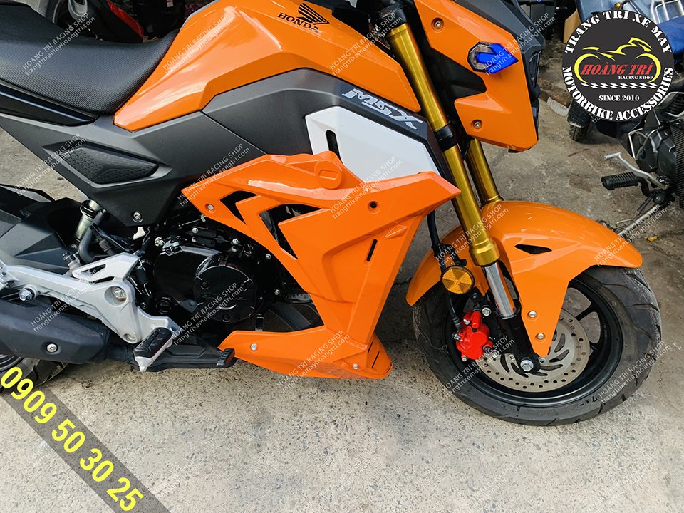 Honda MSX màu cam đen lên cánh gà màu cam