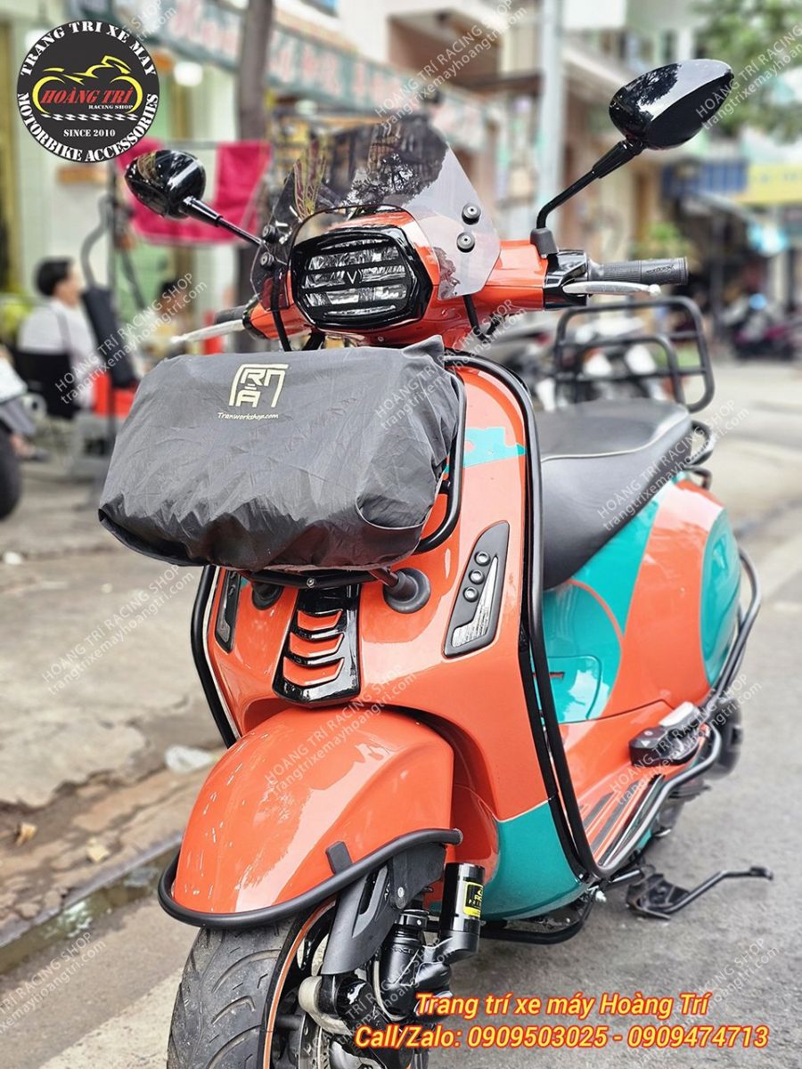 Baga trước sơn tĩnh điện trang bị cho xe Vespa cam - xanh