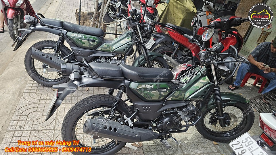 Cả hai xe đều sở hữu cùng tông màu xanh Camo độc đáo của bản ABS