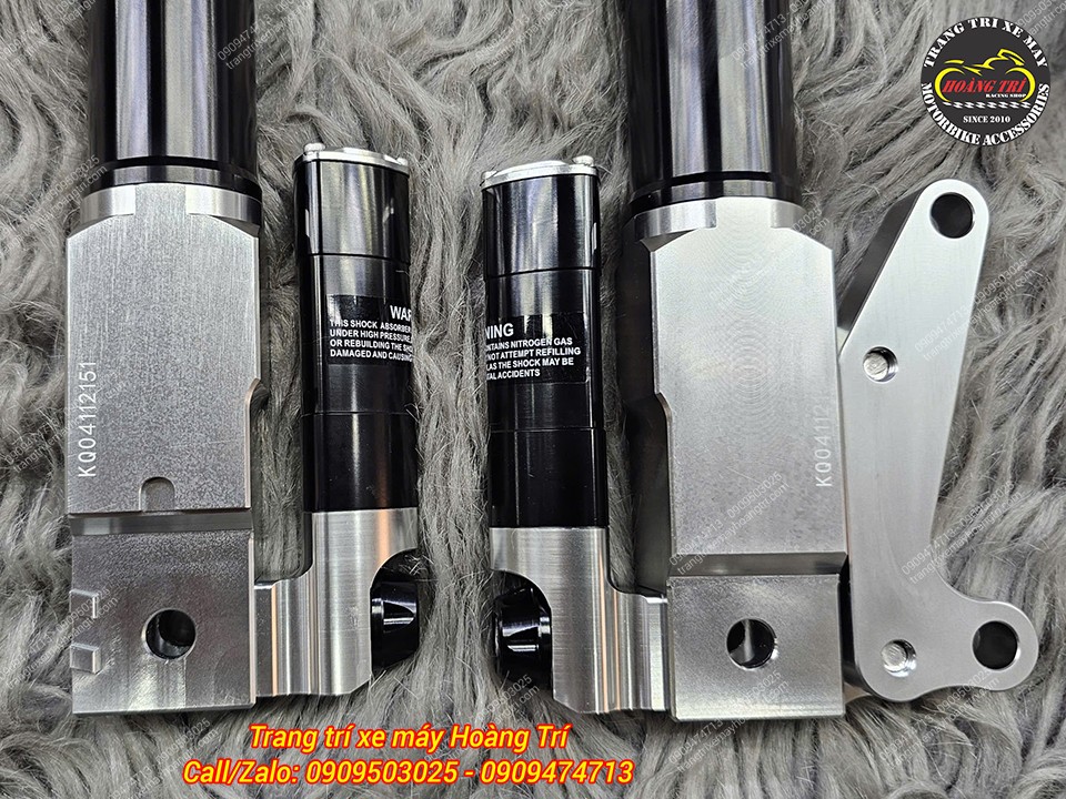 Chân phuộc tích hợp núm chỉnh, dễ điều chỉnh độ nhún theo nhu cầu sử dụng