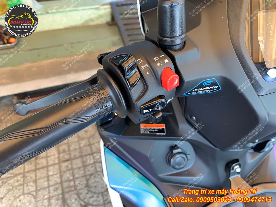 Cận cảnh cụm công tắc Daytona bên trái Exciter 155 2026 với các nút điều khiển bố trí gọn