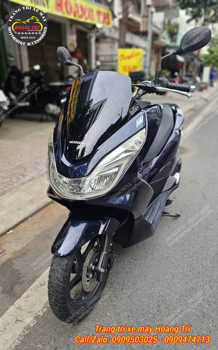 Phần đầu PCX 2015 sau thay áo chính hãng Honda xanh đen X255 trông mới mẻ hơn
