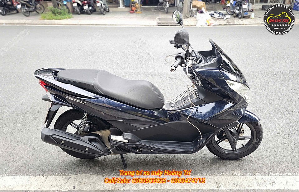 Diện mạo PCX 2015 trở nên bắt mắt hơn với dàn áo Honda xanh đen X255 hoàn thiện