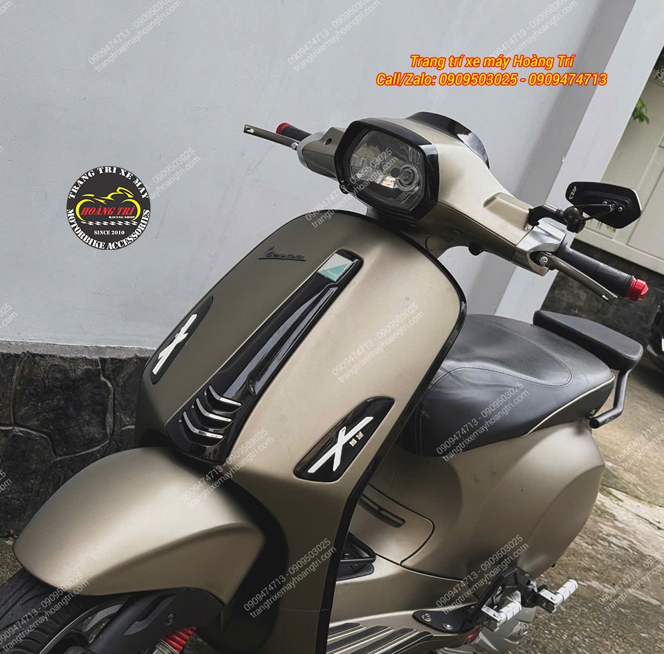 Toàn cảnh dàn đầu Vespa Sprint sau nâng cấp với logo chữ X và nhiều chi tiết đen bóng