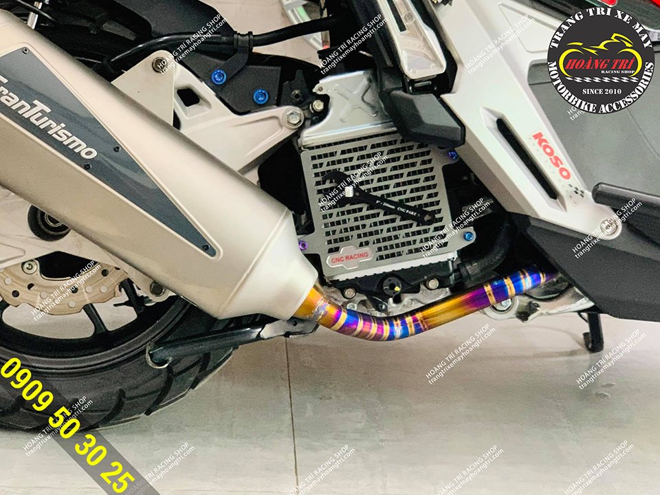 The titanium muffler has been torched for a striking color