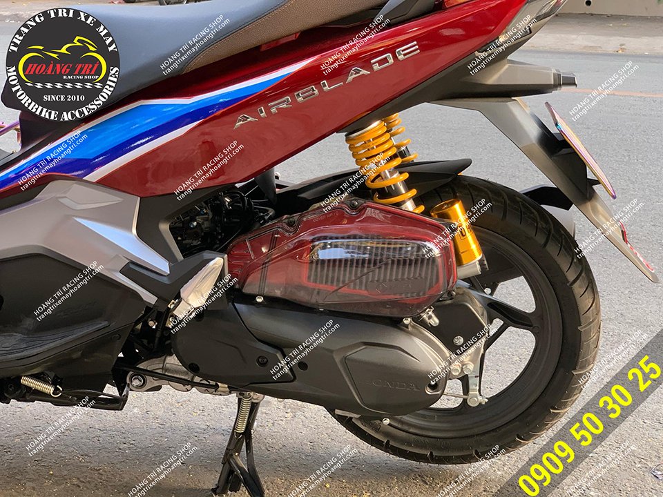 Detailed close-up of the BMC air filter duo and transparent exhaust