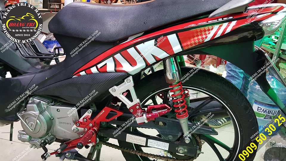 Beautiful red Biker rear footrest on the bike background