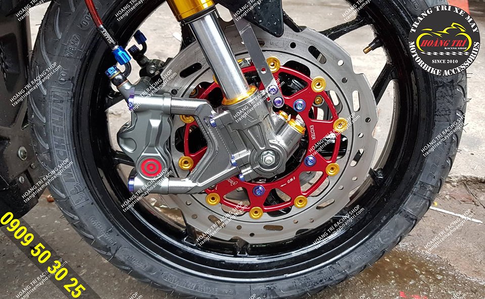 With Brembo oil pig and front plate style screws