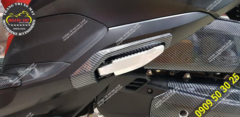 Close-up details of Lead 2018 rear footrest protection cover