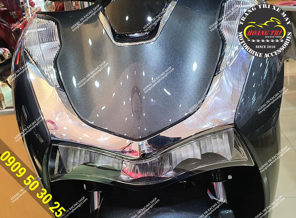 Close-up of genuine Honda Sh 2020 headlight cluster