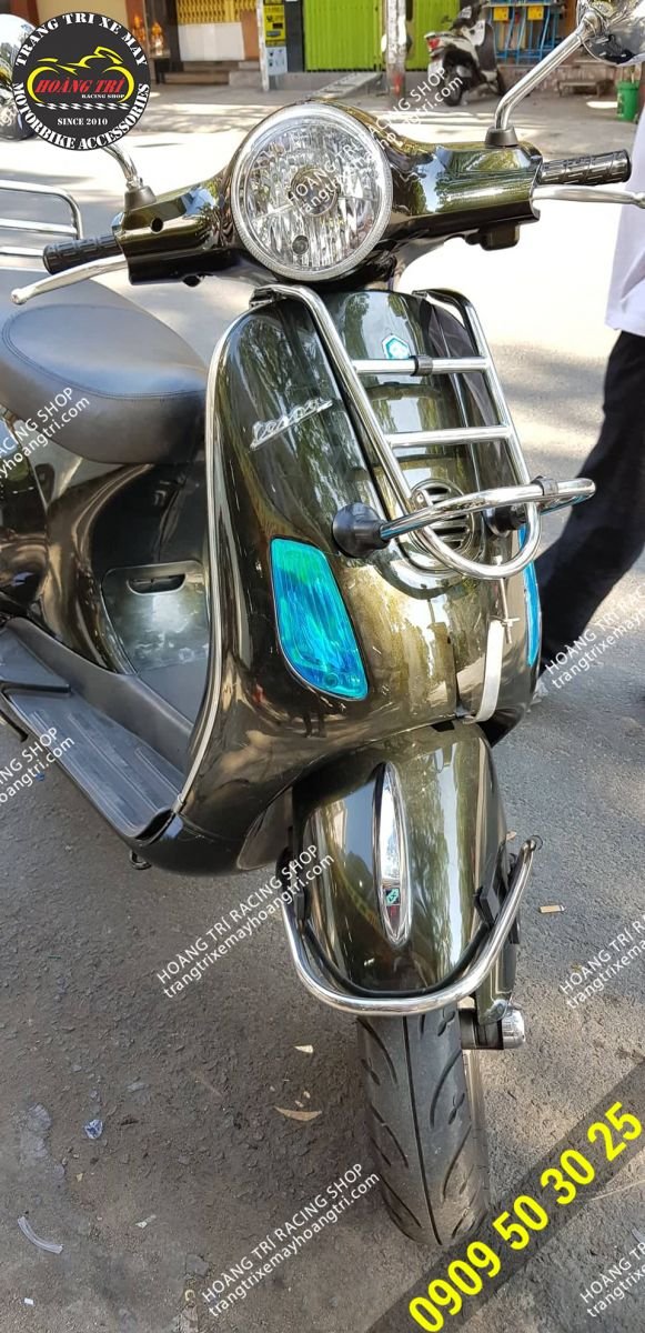 Vespa LX has installed stainless steel front baga