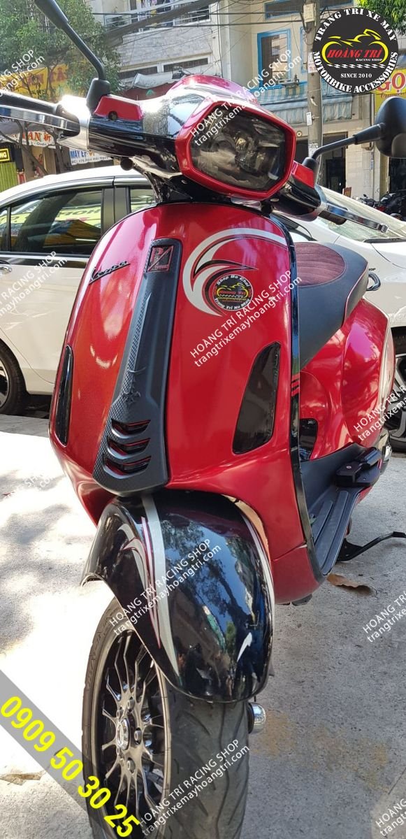 Vespa Sprint Black Style mask cover after being installed on the car