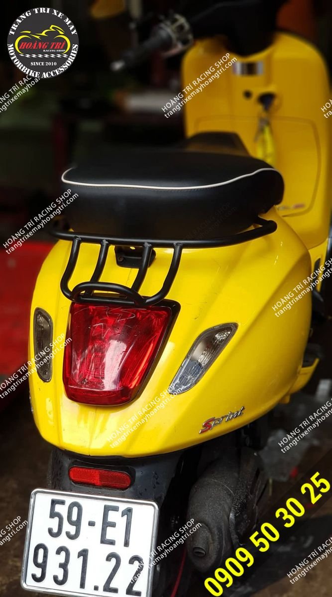 Yellow Vespa Sprint comes to the shop to install rear handlebars