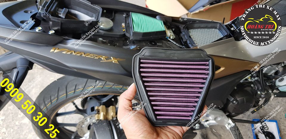 Winner X air filter on hand ready to replace the car
