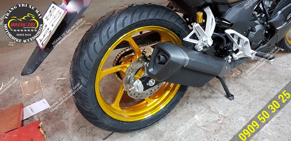 A close-up of the yellow Rapido rear wheel with ABS model