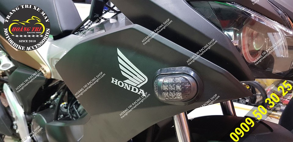 The product completely covers the front turn signal hole of Winner X car